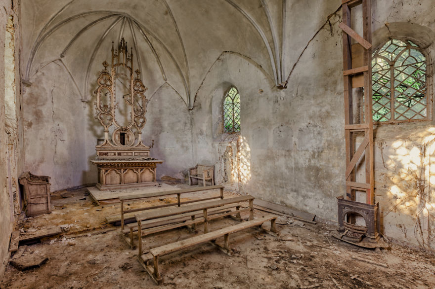 abandoned church with benches and altar