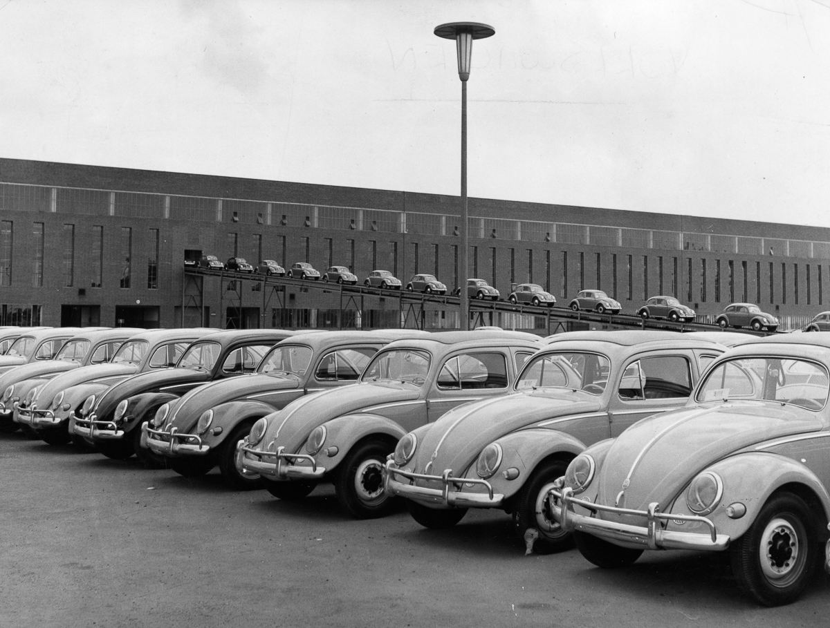 A line-up of brand new Volkswagen Beetle cars at the Wolfsburg factory. (Photo by Keystone Features/Getty Images)