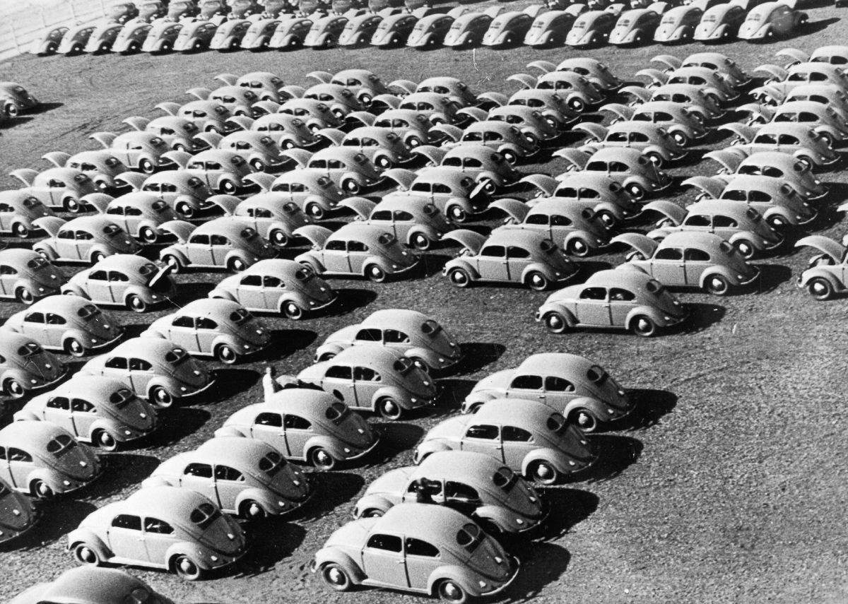 circa 1950: Rows of ' Beetle ' cars at a German Volkswagen plant. (Photo by Fox Photos/Getty Images)